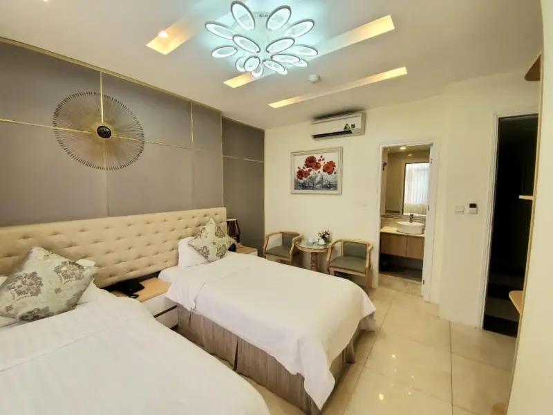 phòng twin tại DLmos Hanoi Hotel